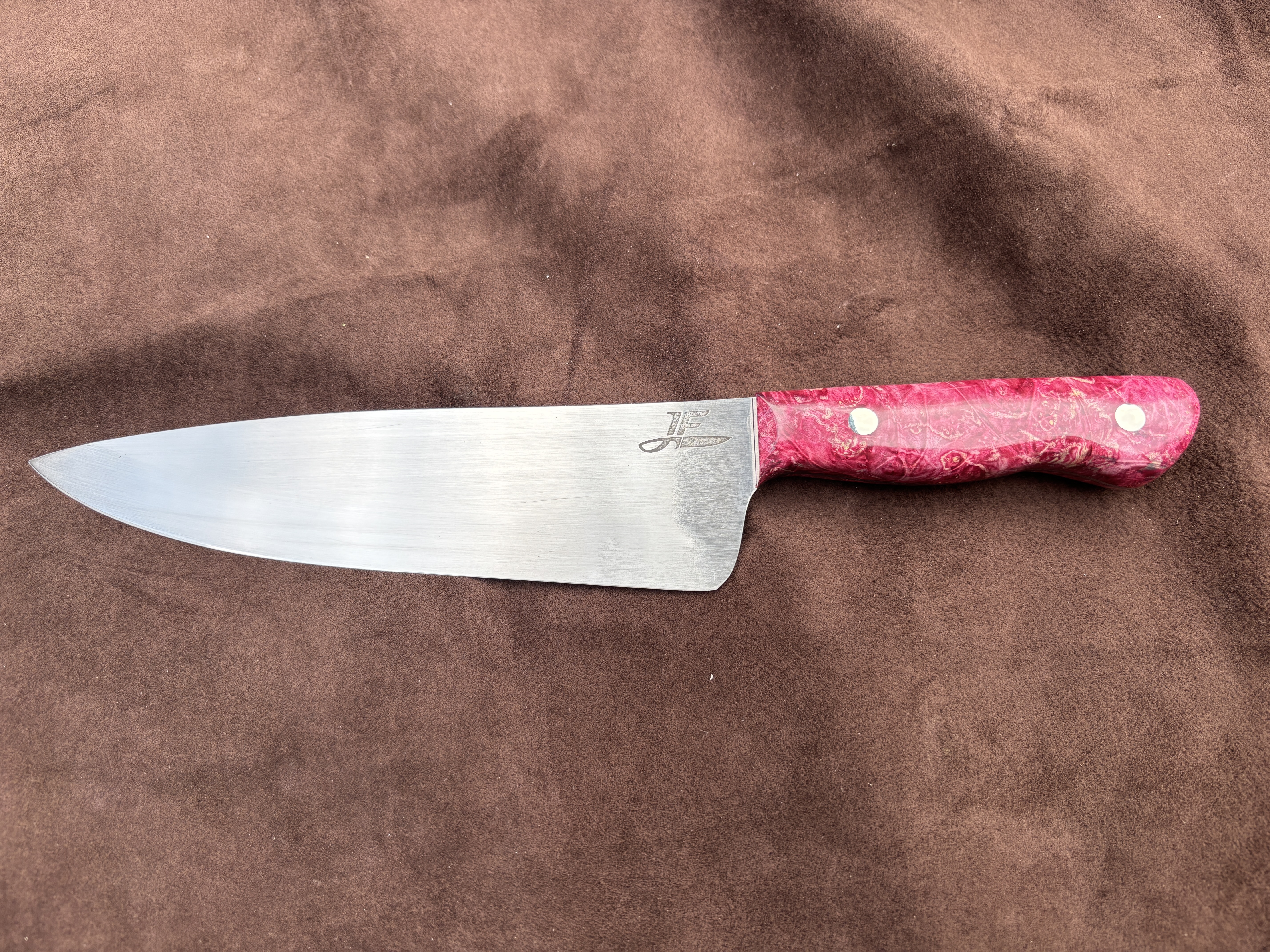 Chefs knife with pink box elder wood handles - front view