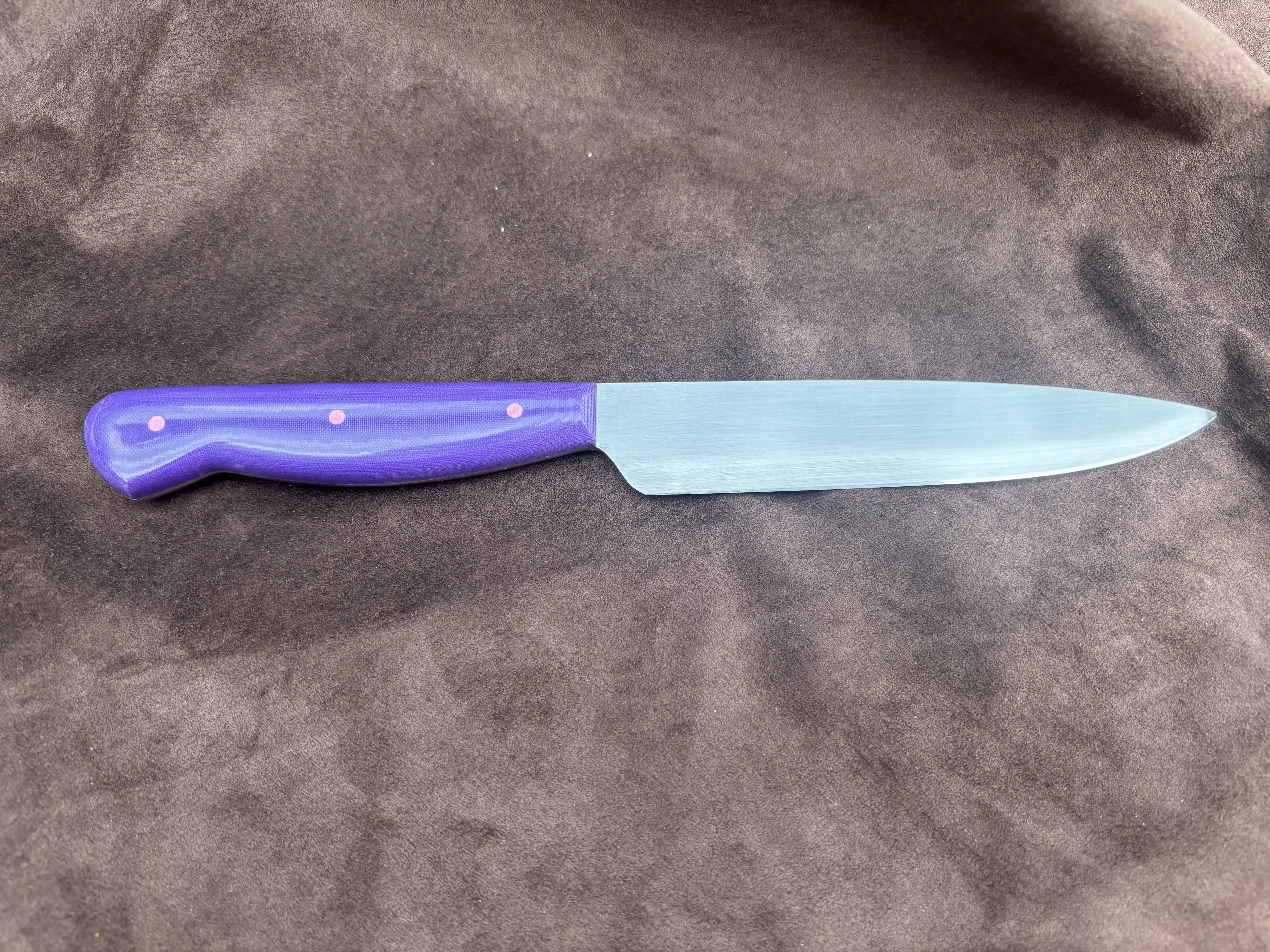 Kitchen prep knife with purple micarta handles - rear view